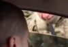 В Харькове сотрудник военкомата разбил окно автомобиля с водителем внутри